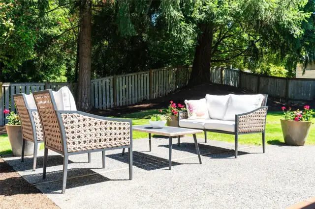 A quiet place to relax, the patio offers a private, tree lined backdrop that creates a park-like setting