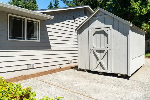 Side yard offers a place for storage shed, and/or additional parking for boat or vehicles