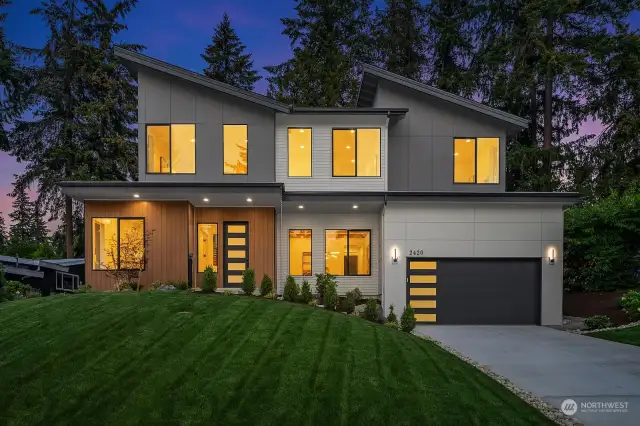 MN Custom Homes presents a stunning modern design in the convenient Phantom Lake neighborhood