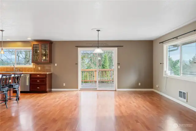 Dining area has doors out to the expansive deck