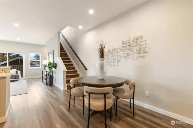 Staircase to upstairs bedrooms and laundry area.