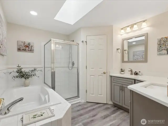 Sumptuous 5-pc Bath with soaking Tub & separate Shower, dual vanity & lovely floors.