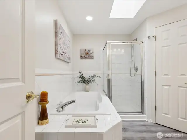Sumptuous 5-pc Bath with soaking Tub & separate Shower, dual vanity & lovely floors.