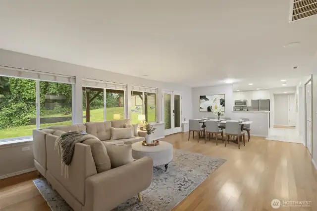 Virtually-Staged great room, open to the kitchen
