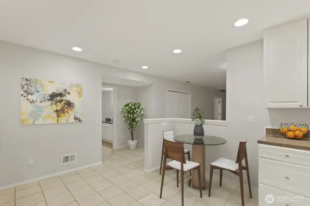 Virtually-Staged shot of the breakfast nook in the downstairs kitchen...nice!