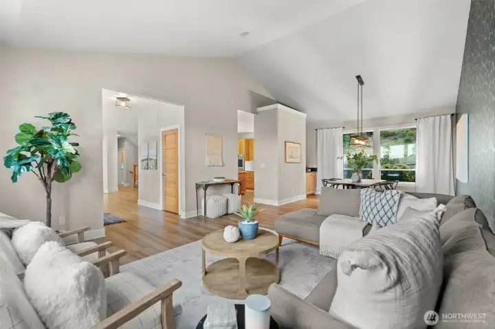 The additional lounge and dining area bring in vaulted ceilings, a butler’s nook, and large windows that frame sweeping views.