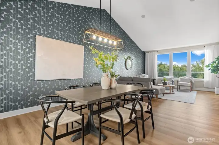 Statement wall with designer wall paper and updated lighting fixtures
