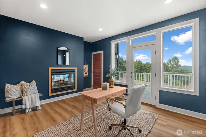 This bonus room can be used as a study, den or office and provides lots of natural light, privacy and storage. The perfect work from home set up!