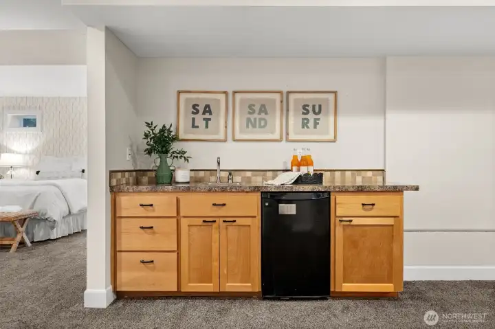 Additional wet bar downstairs for the ultimate rec room entertainment