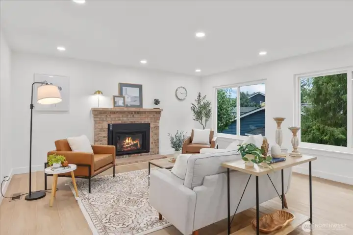 A new gas fireplace anchors the 2nd of the two living areas