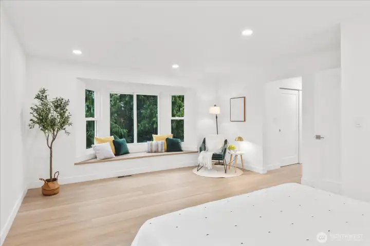 Luxurious and tranquil main suite with bay window bench, walk-in-closet and spa-like bathroom. Luxury vinyl plank flooring, fresh paint, solid wood, single-panel white shaker doors with full wood craftsman bungalow casing trim, and adjustable canless lighting.