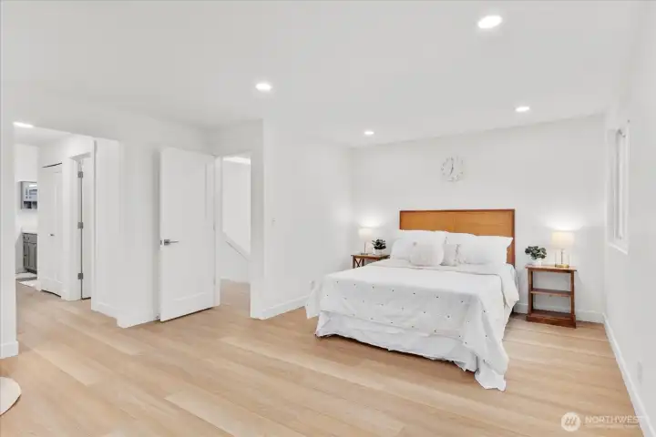 Luxurious and tranquil main suite with bay window bench, walk-in-closet and spa-like bathroom. Luxury vinyl plank flooring, fresh paint, solid wood, single-panel white shaker doors with full wood craftsman bungalow casing trim, and adjustable canless lighting.