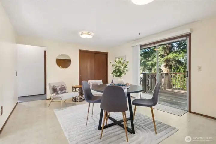 Here's the dining room and this overall room is so big you could even have another living area in here. You'll see the possibilities on the next photo. That closet in the back of this photo measures easily 6 feet wide by 4 feet deep - storage galore!