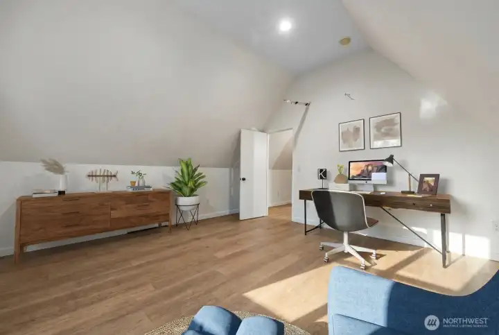 Virtually staged secondary bedroom (1 of 2) on upper level