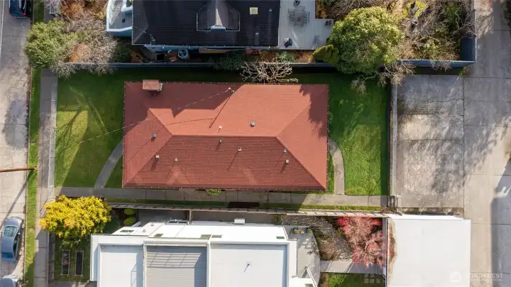 Aerial view of site, street to alley (red roof)