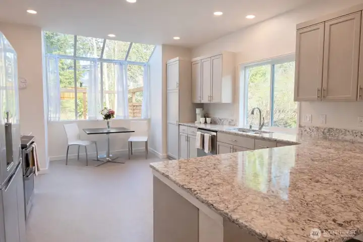 Beautiful atrium window looks out over the back yard.