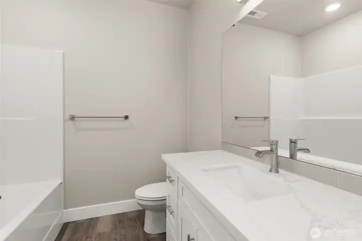 Images shown are from a different home previously constructed by this builder and are provided as examples of workmanship, finish quality, and design style only. The subject property is currently under construction, and specific materials, colors, fixtures, and features may differ upon completion.