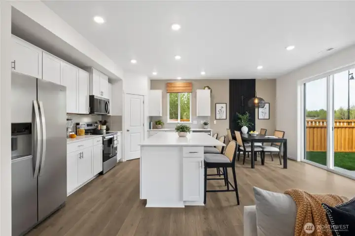 Kitchen and secondary dining. Photos are for representational purposes only, colors, elevation and features may vary.