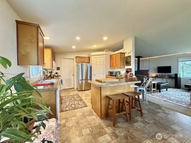 View from dining room of the kitchen and living room