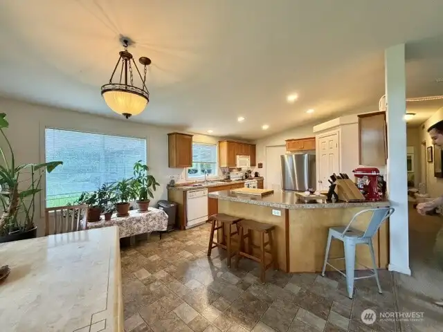 Facing kitchen from dining