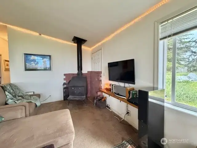 Keep the wood stove for heating or seller will remove.