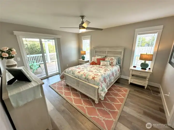 Primary Bedroom with slider leading to covered back deck