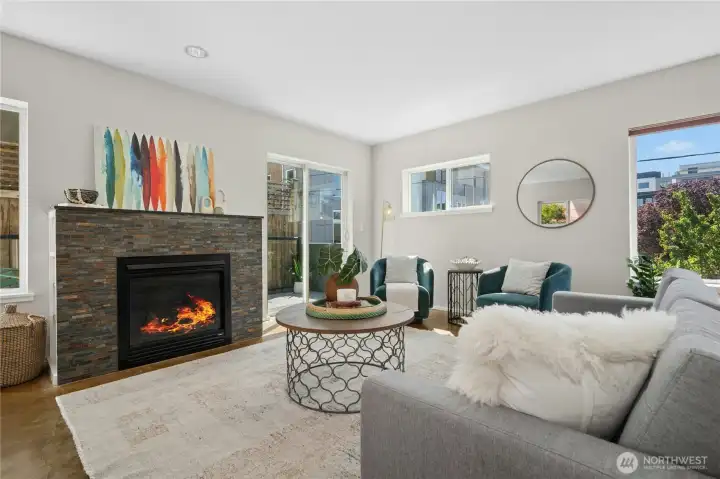 Gas fireplace and sliders to deck