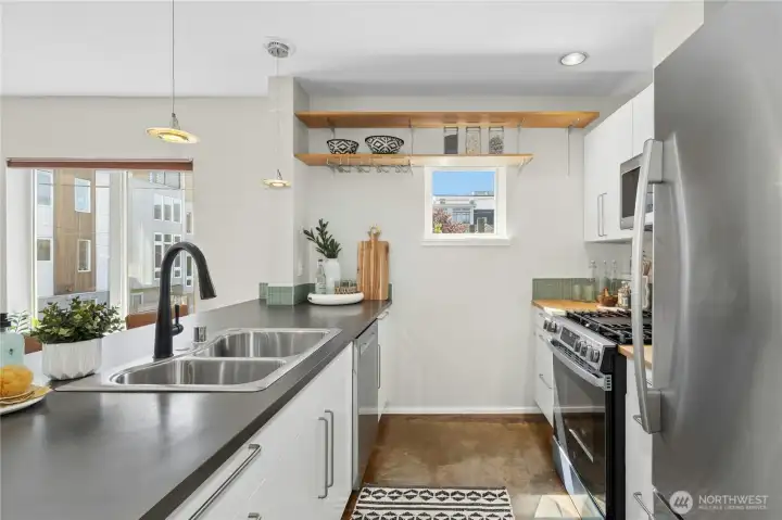 Galley kitchen boasts ewer appliances