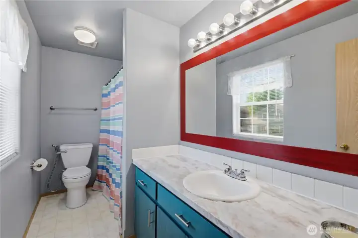 Two full bathrooms and one half bathroom