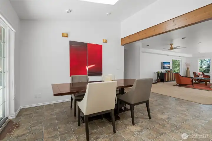Easy flow from dining to living room. Note: Vaulted Ceiling.