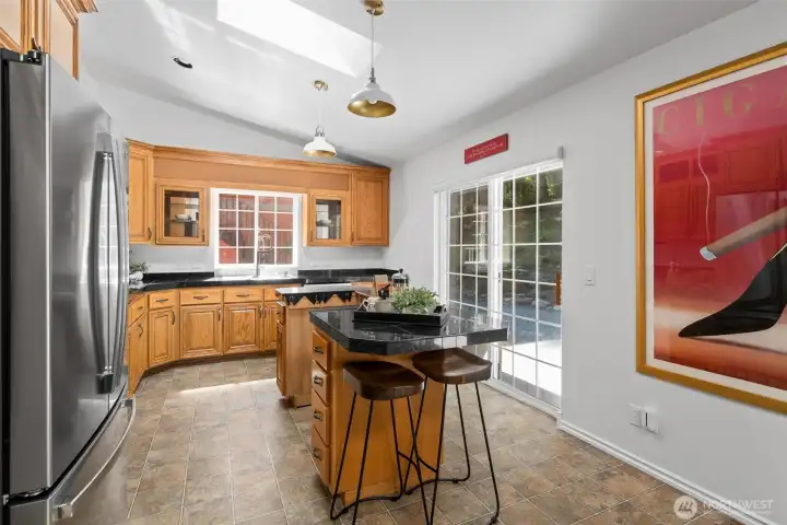 Stainless steel refrigerator and dishwasher.