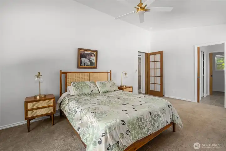 Second primary bedroom. Note: Vaulted ceiling.