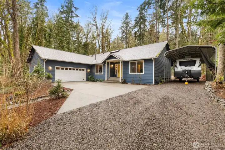 Private drive leads to sweet serenity on the hill.