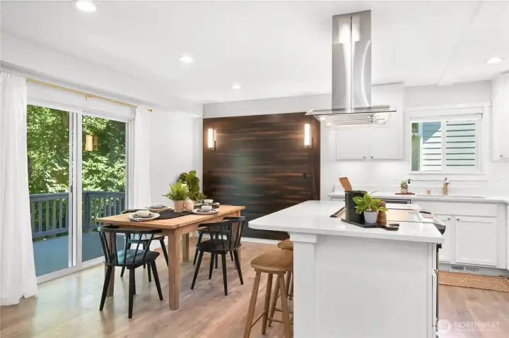 The beautiful accent wall in the dining room brings some depth and contrast to the space. The beautiful accent wall in the dining room brings some depth and contrast to the space.