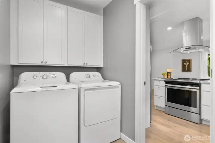 Dedicated mud and laundry room connects the garage to the kitchen - perfectly located for daily life. Dedicated mud and laundry room connects the garage to the kitchen - perfectly located for daily life.