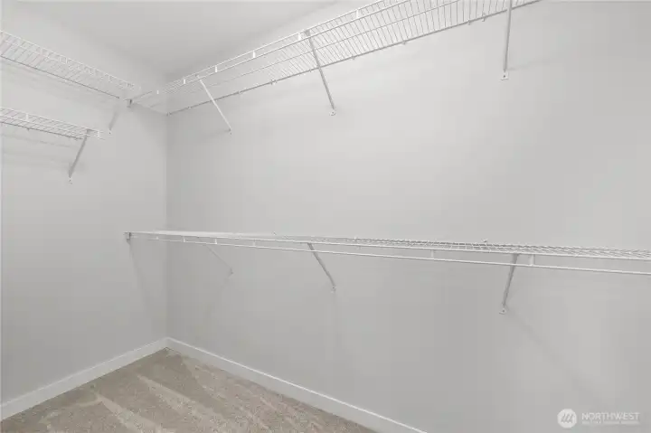 Another view of the large walk-in closet Another view of the large walk-in closet