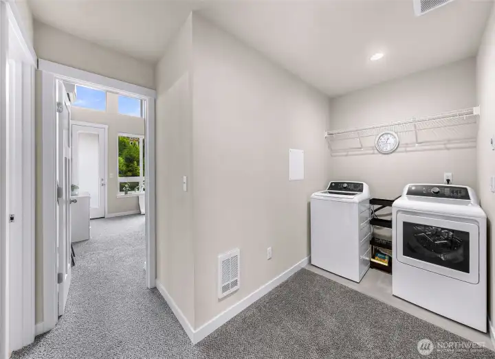 Laundry is located between the primary and another bedroom Laundry is located between the primary and another bedroom