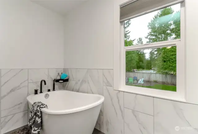 Soak away the stress of the day in this charming soak tub.