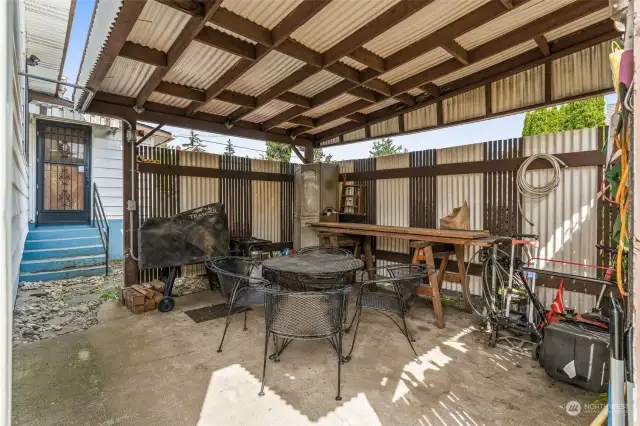 Oh the things you could do under this covered area...Entertaining, gathering, grilling, talking, laying, contemplating  "¯\_(?)_/¯"  whatever you want. It can also keep your landscaping tools from the rain or snow or hail.
