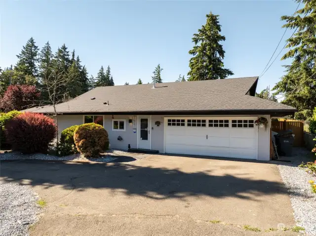 Home is move-in ready, with brand-new exterior paint this June 2024 and newer roof, installed in 2021! Circular Drive makes getting in and out of this property super convenient!