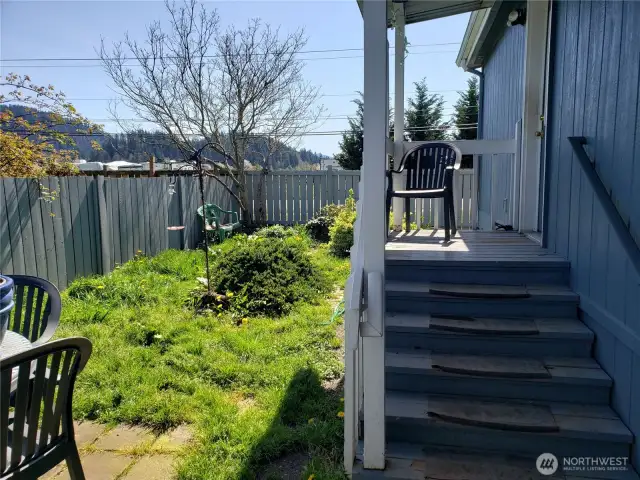 Side Yard by Back Entry Door off the Carport.