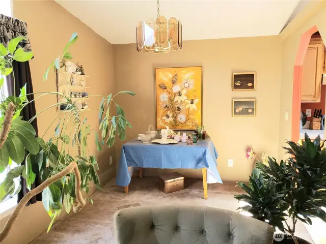 Picture from the Living Room of the Dining Room Area off the Living Room and Kitchen.