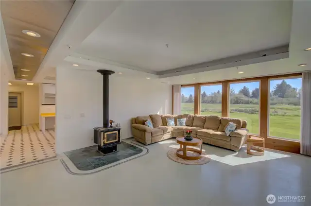 Main floor living room looking into the kitchen
