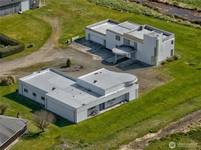 3,600 sq ft custom house & garage, 4 bedrooms, 2.5 bath with 4100 sq ft detached  6 car garage with wood shop and storeroom.