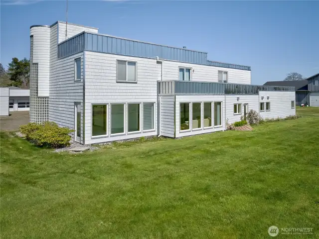 3,600 sq ft custom house & garage, 4 bedrooms, 2.5 bath with 4100 sq ft detached  6 car garage with wood shop and storeroom.