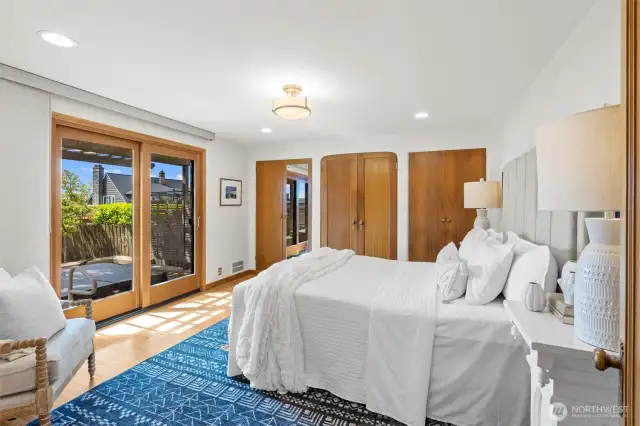 Primary Bedroom w/ easy access to private Hot Tub