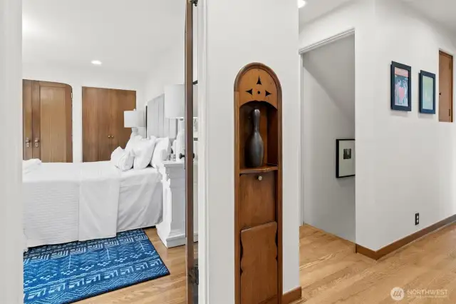 Hallway w/ phone niche and social seat