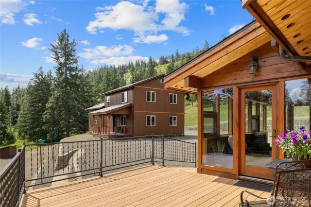 Looking from deck of main home over to the bunk house.
