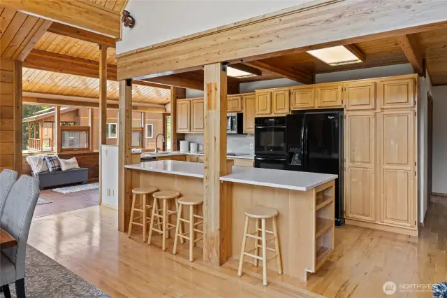 Beautiful wood flooring flows from the kitchen and throughout the home.