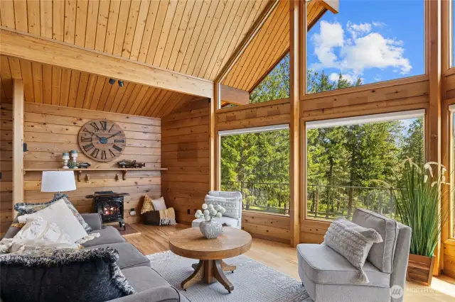 The propane stove adds cozy ambiance while perfectly complementing the ultra energy-efficient geothermal heating system.